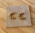 Boucle d'oreille doré