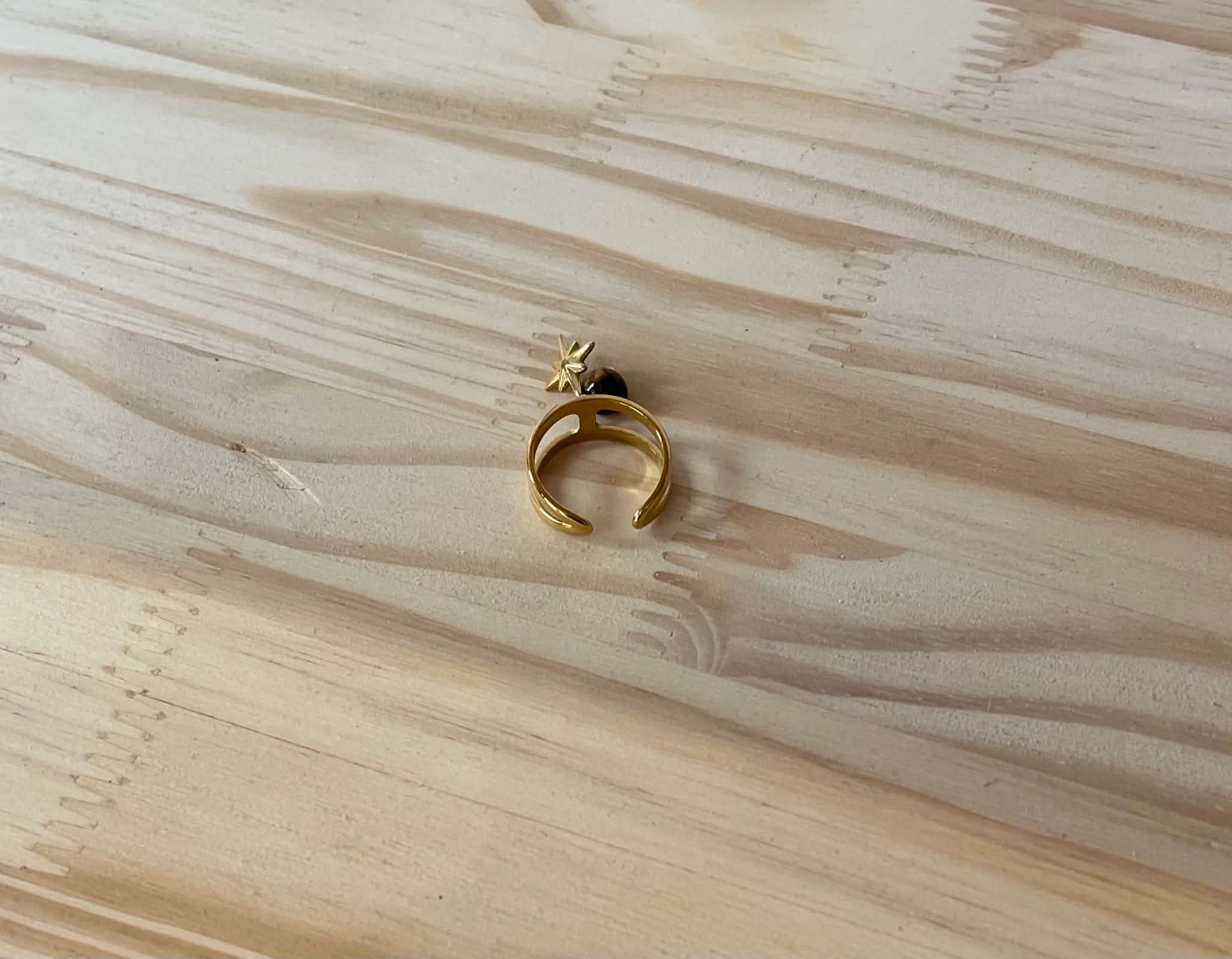Bague doré a pampilles marron