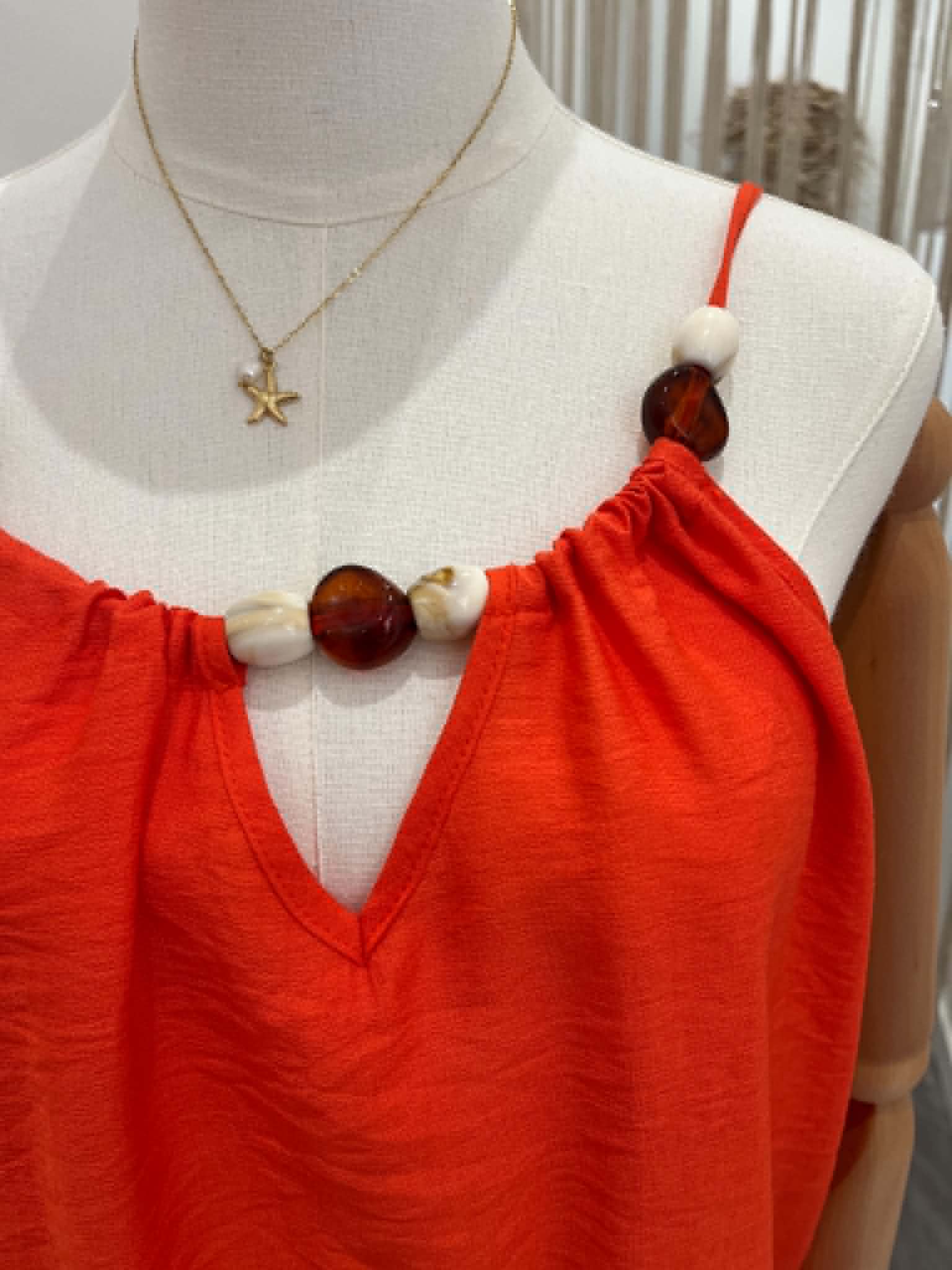 Haut orange a bretelle