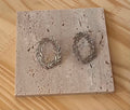 Boucle d'oreille ronde a feuilles argenté