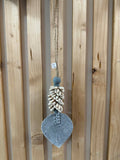 Feuille de suspension Coquillages Kauri