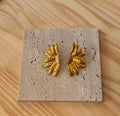 Boucle d'oreille doré demis soleil