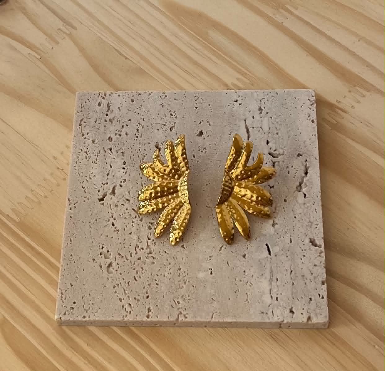 Boucle d'oreille doré demis soleil