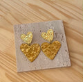 Boucle d'oreille a coeurs doré