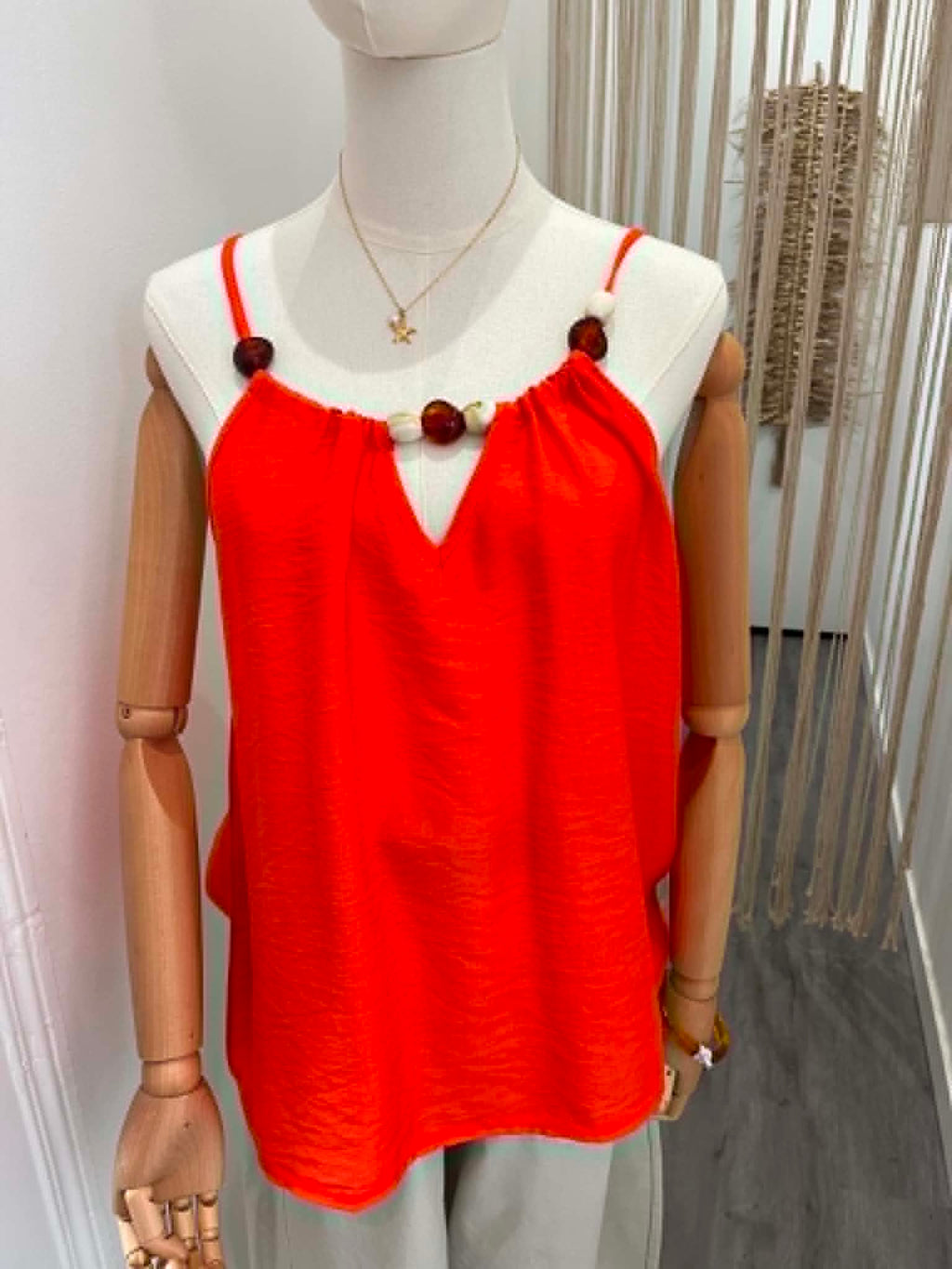 Haut orange a bretelle