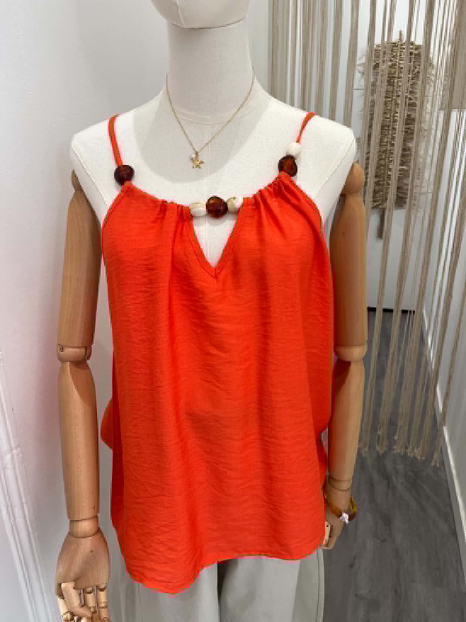Haut orange a bretelle