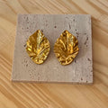 Boucle d'oreille doré feuille