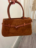 Sac a main marron avec détails en cuir